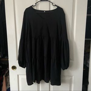Long sleeved, black dress